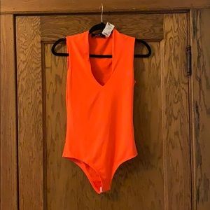 AKIRA Neon orange bodysuit
